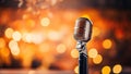 Retro microphone on stage with bokeh background. Music concept Royalty Free Stock Photo