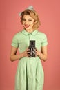 Retro model. Fashionable woman posing. Retro woman with vintage camera. s Royalty Free Stock Photo