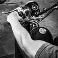 Retro motorbike. Black white picture of a muscular biker