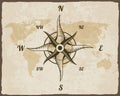 Retro nautical compass. Hand drawn wind rose on map background. Old vector design element for marine theme and heraldry Royalty Free Stock Photo