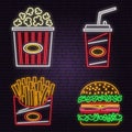 Retro neon burger, cola, popcorn and french fries sign on brick wall background. Design for cafe. Vector. Neon design Royalty Free Stock Photo