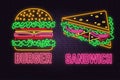 Retro neon burger and sandwich sign on brick wall background. Design for fast food cafe.