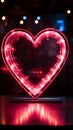 Retro neon hearts Bright, vintage sign on a striking black backdrop