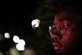 Retro neon portrait of an African American. Black man with modern glasses Royalty Free Stock Photo