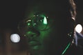 Retro neon portrait of an African American. Black man with modern glasses Royalty Free Stock Photo