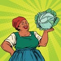Retro old African-American woman with a head of cabbage Royalty Free Stock Photo