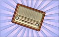 Retro old antique hipster radio receiver from the 70s, 80s, 90s, 2000s against a background of abstract blue rays. Vector Royalty Free Stock Photo