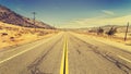 Retro old film style country highway in USA. Royalty Free Stock Photo