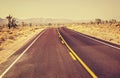 Retro old film style USA endless country highway. Royalty Free Stock Photo