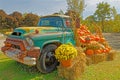 retro old \'56 GMC 350 loaded with Fall agriculture harvest products
