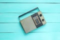 Retro old radio receiver on a blue wooden background. Top view. Outdated technology. Royalty Free Stock Photo