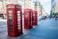 Retro old red telephone booths on Royal mile street in Edinburgh, capital of Scotland, United Kingdom Royalty Free Stock Photo