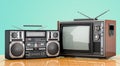 Retro old TV set and Boombox. 3D rendering on the wooden desk Royalty Free Stock Photo