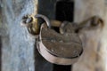 Retro padlock on a wooden door Royalty Free Stock Photo