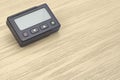 Retro pager on wooden desk Royalty Free Stock Photo