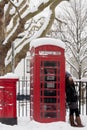 Retro phone booth in the snow Royalty Free Stock Photo