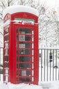 Retro phone booth in the snow Royalty Free Stock Photo