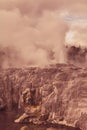 Retro photo of active geysers near Rotorua, New Zealand.