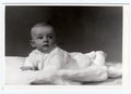 Retro photo of baby boy (six months old). Portrait photo was taken in photo studio on March 10, 1972