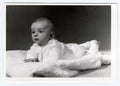Retro photo of baby boy (six months old). Portrait photo was taken in photo studio on March 10, 1972