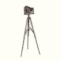 Retro photo camera on tripod, hand drawn doodle, drawing in gravure style, sketch illustration Royalty Free Stock Photo
