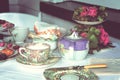 Retro photo of table set for tea. Toned image