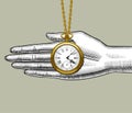 Retro pocket watch on the palm of woman`s hand