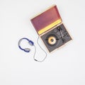 Old vinyl turntable player with headphones with record isolated on a white background Royalty Free Stock Photo