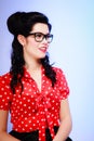 Retro. Portrait of pinup girl in eyeglasses