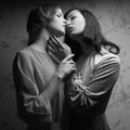 Retro portrait of two gorgeous women (girlfriends) kissing Royalty Free Stock Photo