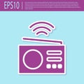 Retro purple Smart radio system icon isolated on turquoise background. Internet of things concept with wireless