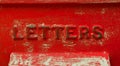 Retro red letter box with crackled paint