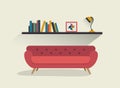 Retro red sofa and book shelf with lamp. Royalty Free Stock Photo