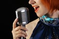 Retro redhead female singer Royalty Free Stock Photo