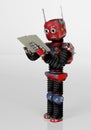 Retro robot with book,3d render Royalty Free Stock Photo