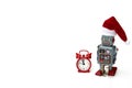 Retro robot with Santa hat is ready to meet Christmas and New Year