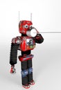 Retro Robot with Tin Can Phones. 3d render Royalty Free Stock Photo