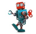 Retro Robot wound up with a key. Isolated. Contains clipping path Royalty Free Stock Photo