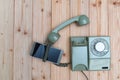 Retro rotary telephone or vintage phone with cable and new cell Royalty Free Stock Photo