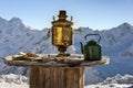 Retro Russian samovar in mountains Royalty Free Stock Photo