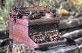 Retro rusty metal typewriter with broken keys Royalty Free Stock Photo