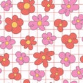 Retro 60s groovy psychedelic seamless pattern background. Cartoon hippie style pink flowers, hand drawn daisies on Royalty Free Stock Photo