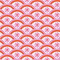 Retro 70s pink flowers on pink and orange rainbow circles seamless pattern .