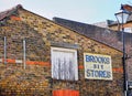 Retro Scene of Brick Wall with various indications of a long life