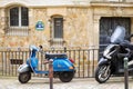 Retro scooter parked on Paris street Royalty Free Stock Photo