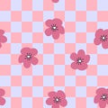 Retro seamless pattern with flowers on checkered background. Simple floral print for fabric, paper, T-shirt. Doodle vector Royalty Free Stock Photo