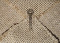 Retro skeleton key on envelope shaped burlap jute open woven fabric