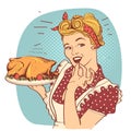 Retro smiling housewife cooks roasted turkey in the kitchen Royalty Free Stock Photo