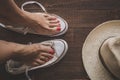 Retro sneakers left on wooden floor Royalty Free Stock Photo