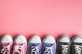 Retro sneakers. Tennis shoes on pink background. Royalty Free Stock Photo